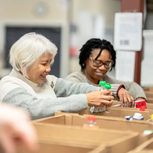 Volunteers sorting food